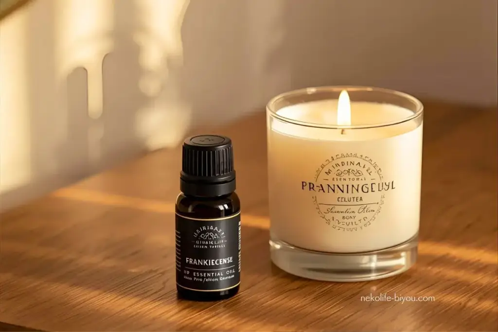 フランキンセンスの精油ボトルとキャンドルの写真|香りでセルフイメージが変わる理由|潜在意識に届くアロマ心理学